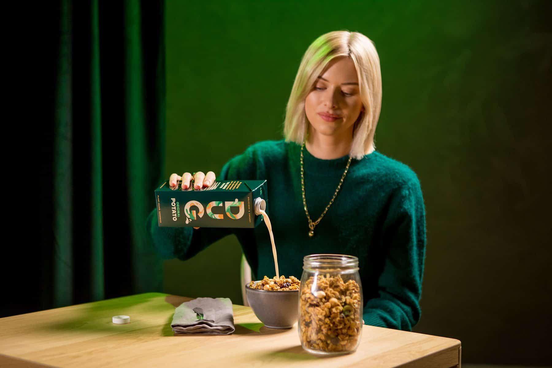 DUG lifestyle lady pouring milk cereal