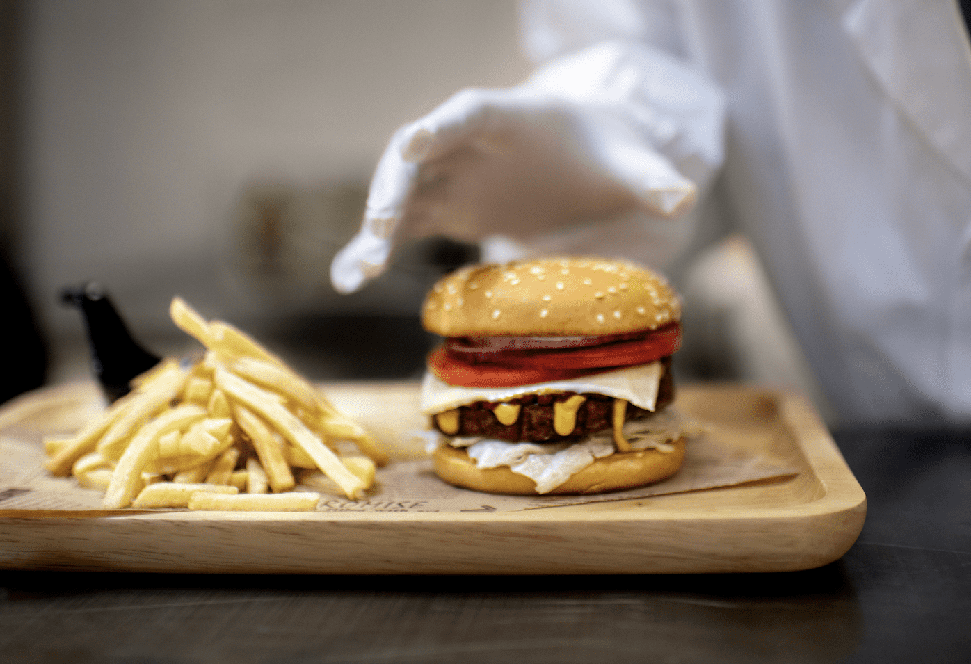 Product developer preparing a burger and fries_Shanghai-5285