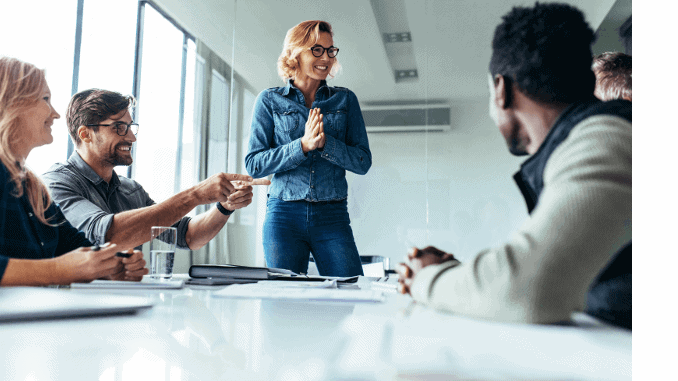 Young woman presenting her idea to colleagues